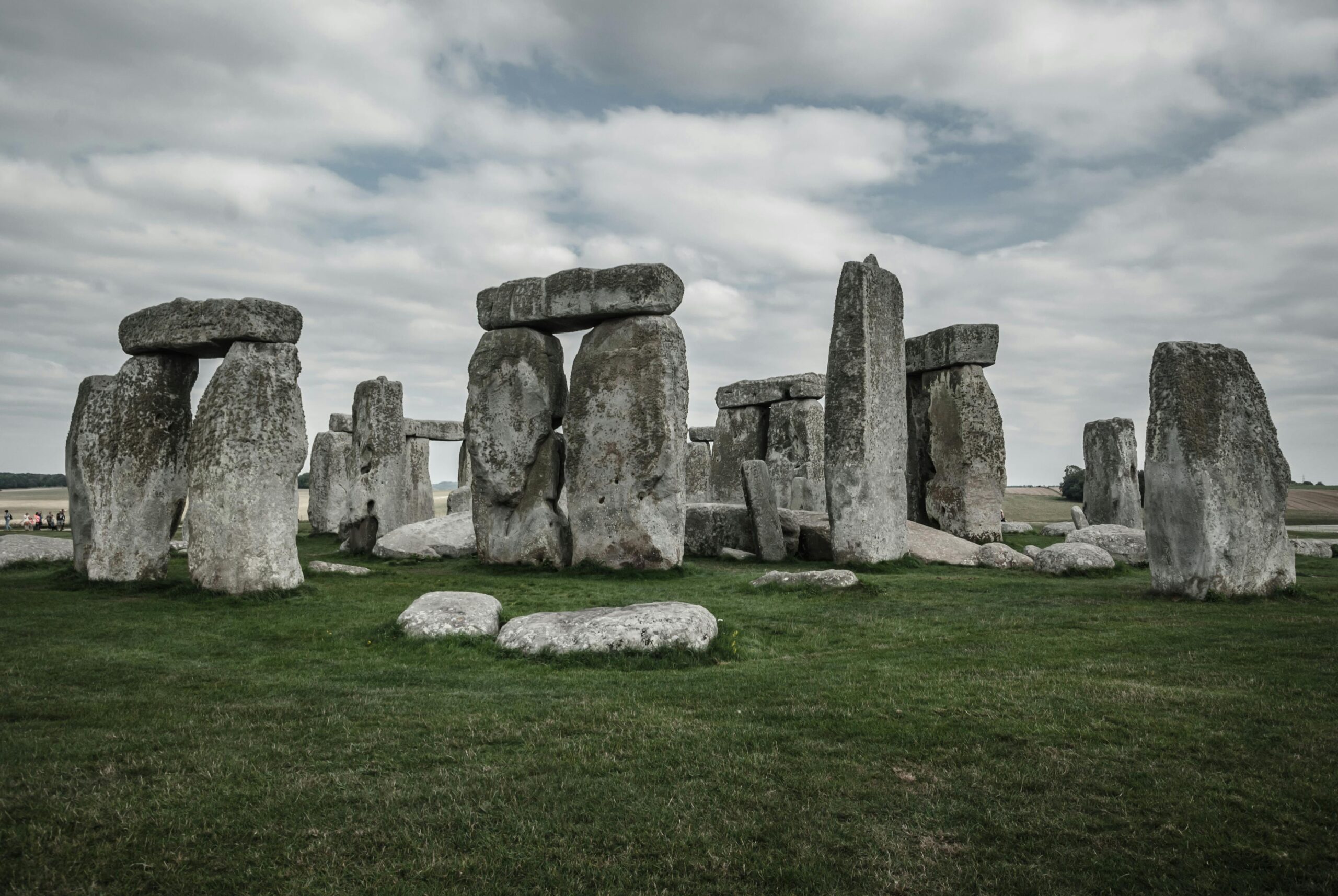 Explore the ancient wonder of Stonehenge with its iconic stone formations under a captivating sky.