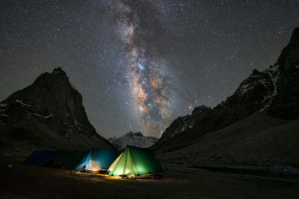 Starry sky with Milky Way over a remote campsite in Zanskar, Himalayas.