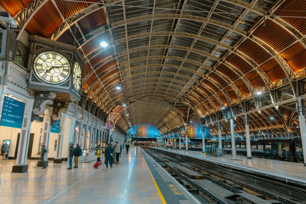 Interior of Paddington Station in London showing its architectural elegance and bustling atmosphere.