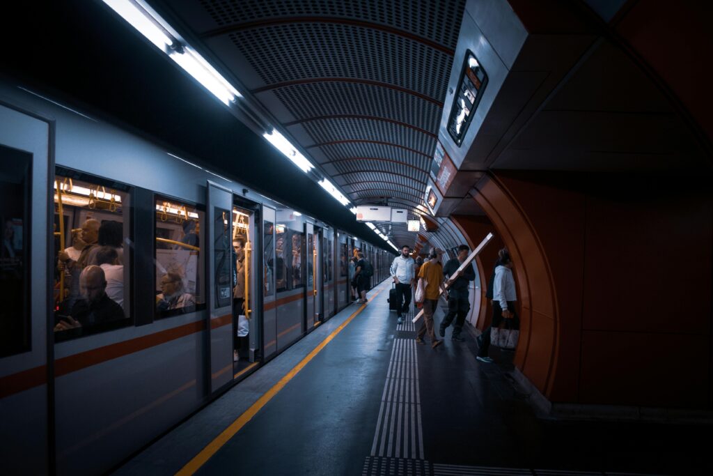 People Walking on the Platform at a Subway Station