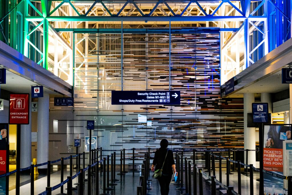 A traveler enters the security checkpoint at O'Hare Airport terminal, Chicago.