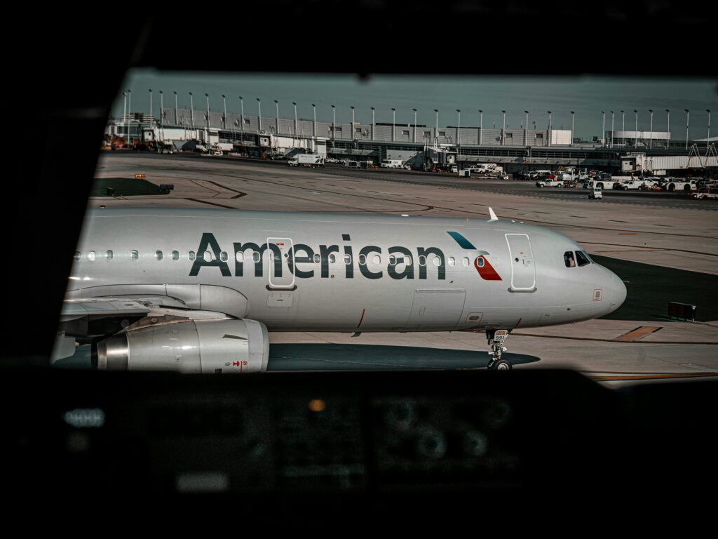 Commercial airplane from American Airlines positioned on airport tarmac, ready for departure or arrival.