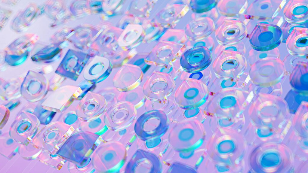 Vibrant abstract 3D render featuring transparent glass shapes with a holographic effect.