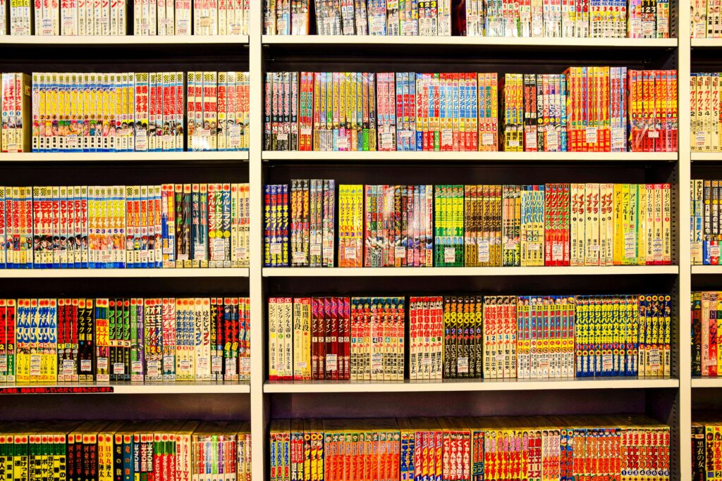 Vibrant shelves filled with Japanese manga in a bookstore. Perfect for comic enthusiasts.