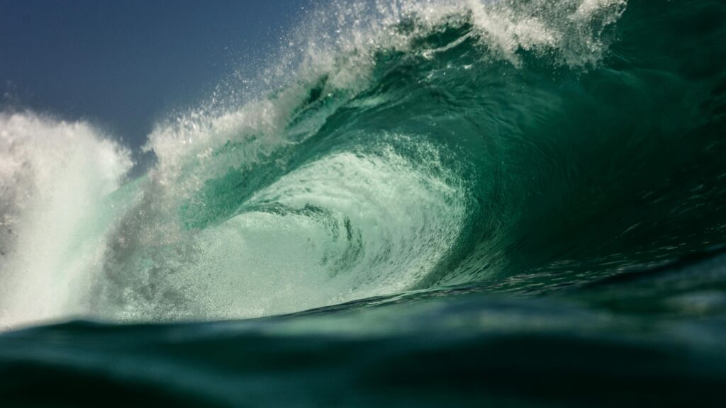 A stunning capture of a powerful ocean wave forming a tube off the coast of Chile.