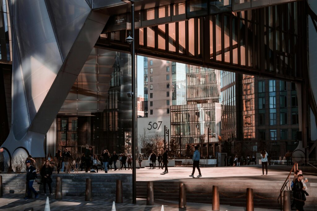 A bustling urban scene showcasing modern architecture and daily life in New York City.