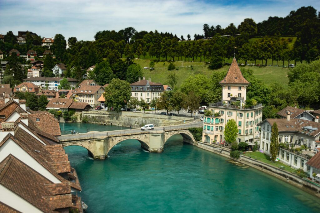 Aerial shot of Untertorbrücke bridge over the Aare River in Bern, Switzerland, with historic buildings.