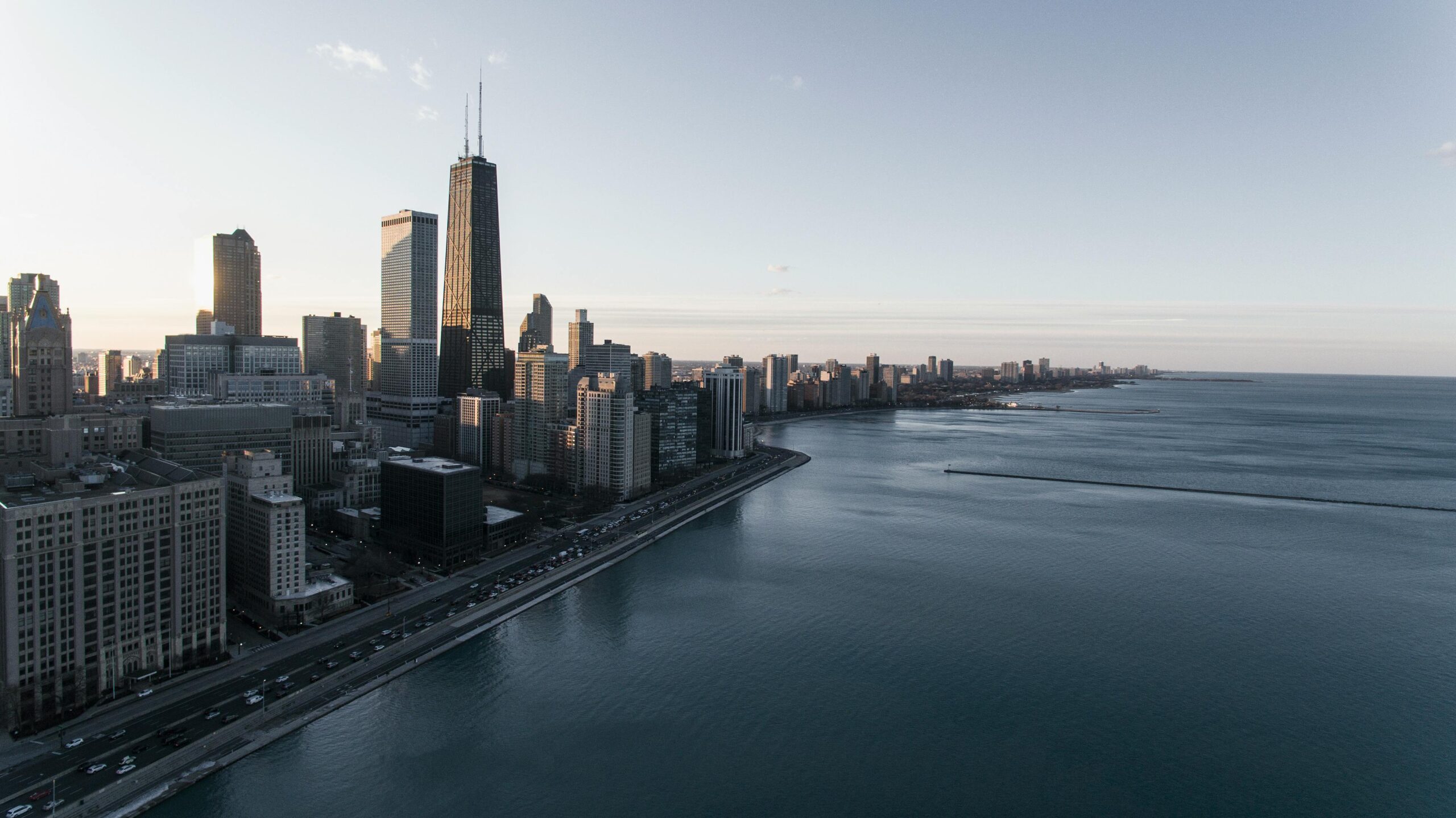 Stunning aerial view of Chicago's skyline during dusk with a waterfront view.