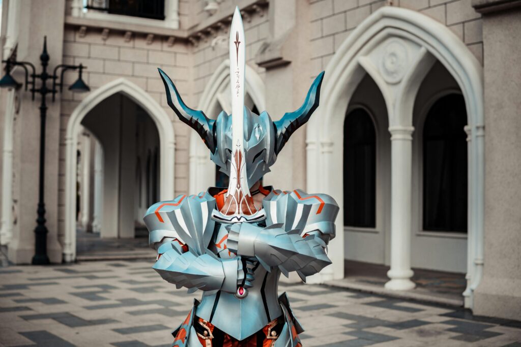 A person in detailed fantasy armor holding a sword in front of an architectural backdrop, creating a dramatic atmosphere.