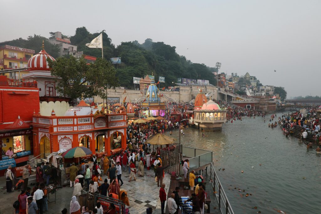 Crowds gather at Har Ki Pauri Ghat in Haridwar, India, for evening rituals.