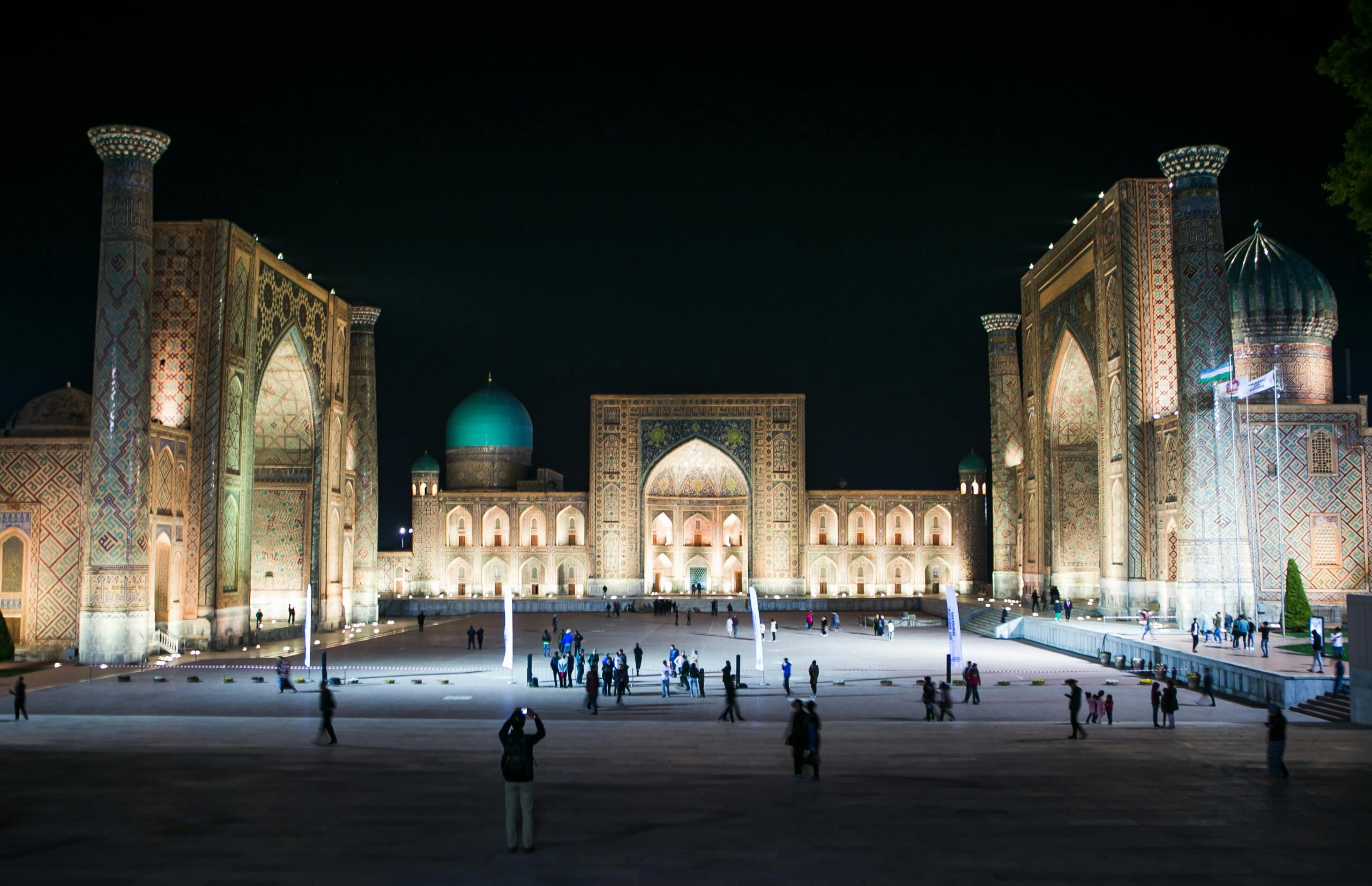 Beautiful night view of Registan Square, a historic Islamic architecture site in Samarkand, Uzbekistan.