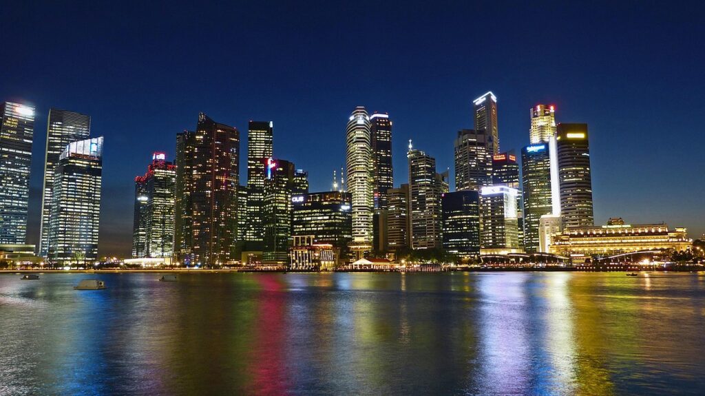 skyline, cityscape, buildings, skyscrapers, illuminated, city lights, city, waterfront, office buildings, financial district, business district, nature, urban, metropolitan, infrastructures, singapore river, water, river, reflection, towers, night sky