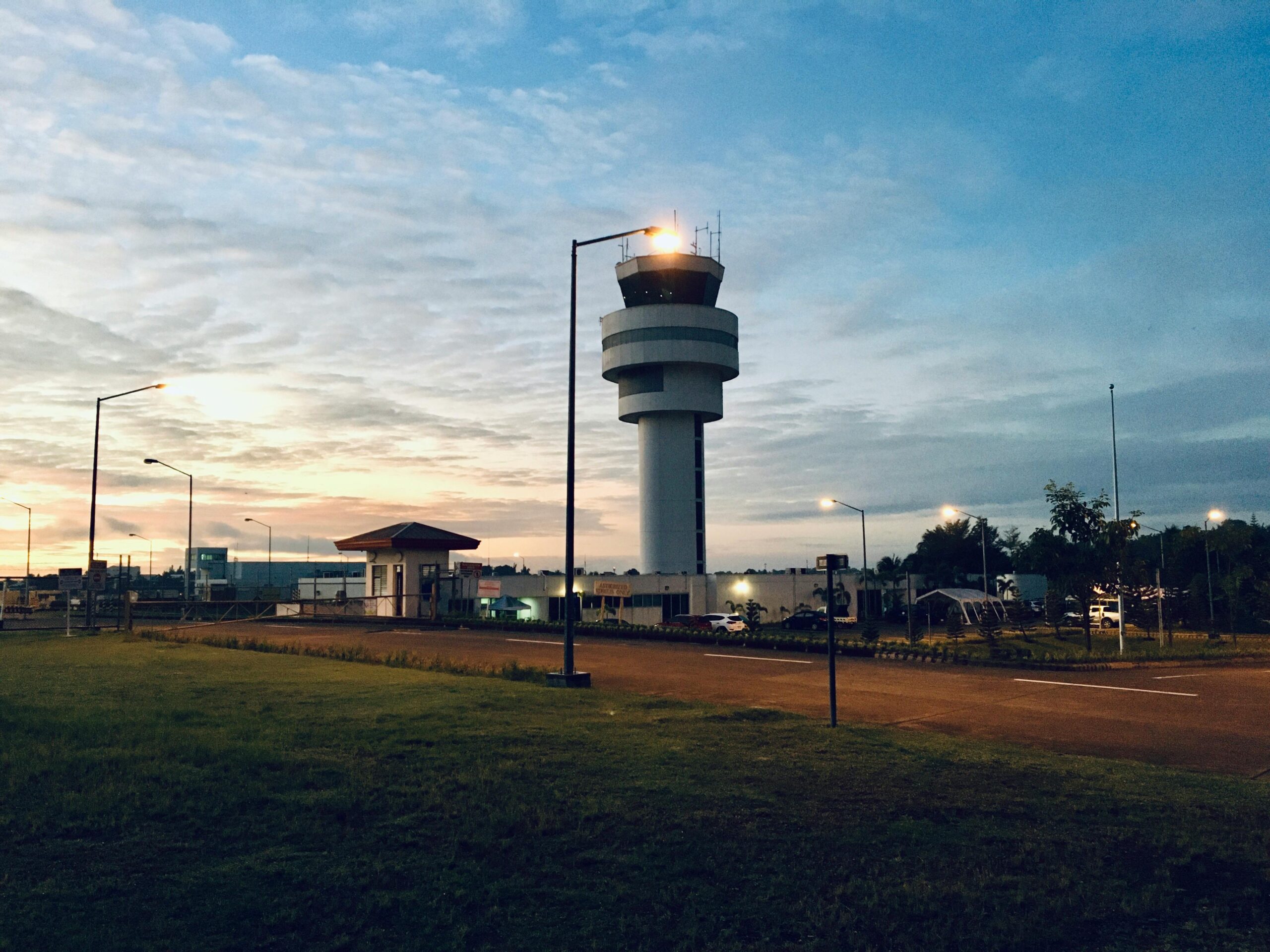 View of the control tower in Davao City, Philippines, during sunset with a serene sky.