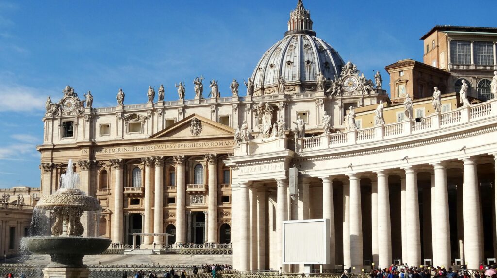 Stunning view of St. Peter's Basilica and Square in the heart of Vatican City, showcasing iconic architecture.