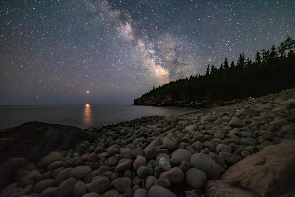 Gorgeous night sky with Milky Way galaxy over Bar Harbor's rocky coastline.