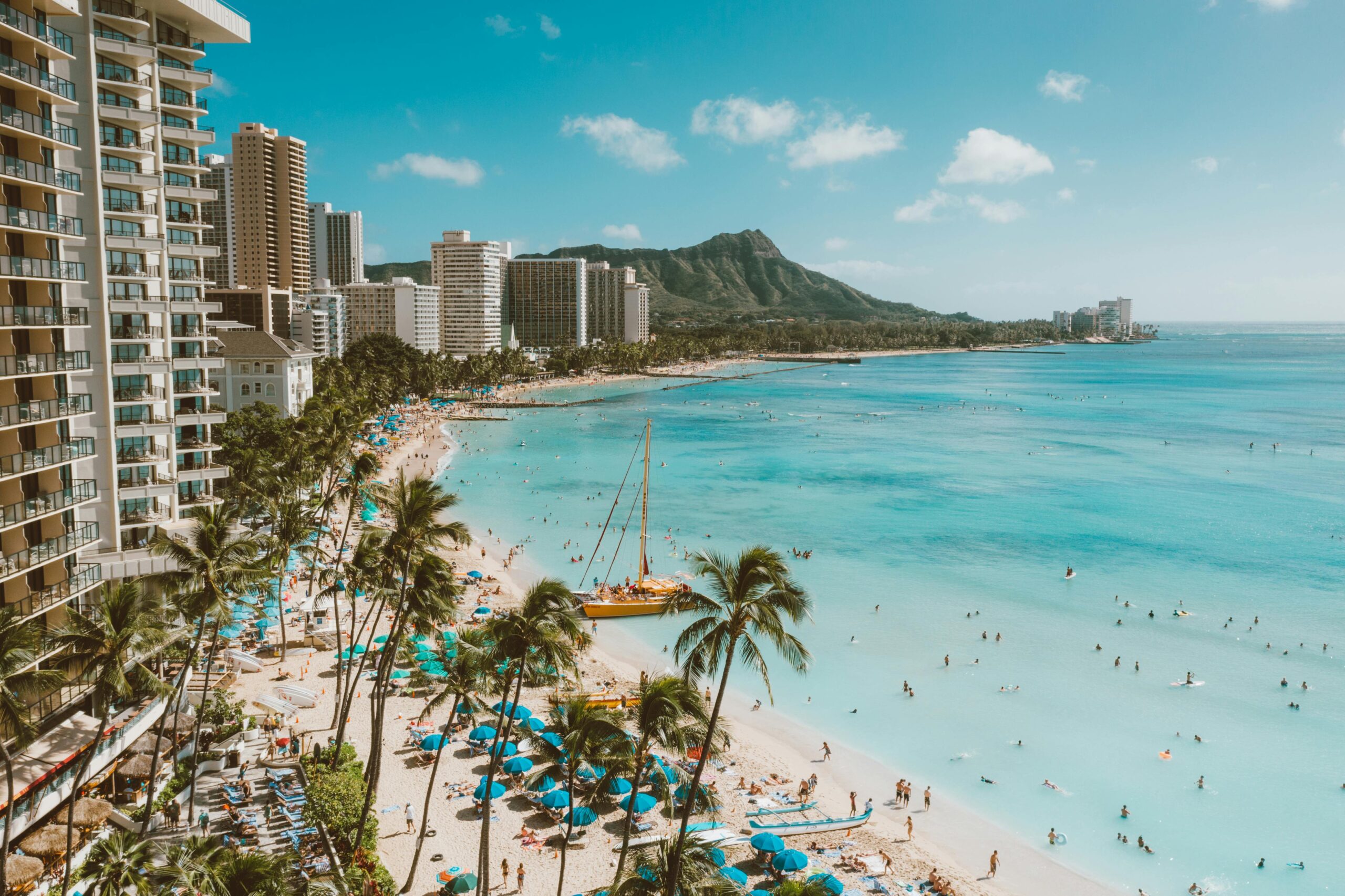 A stunning aerial view of Waikiki Beach, Honolulu with Diamond Head in the background.