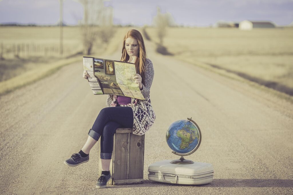 globe trotter, traveller, world map, globe, map, journey, planning, waiting, female, woman, world, road, dirt road, travel, traveling, outdoors, young woman