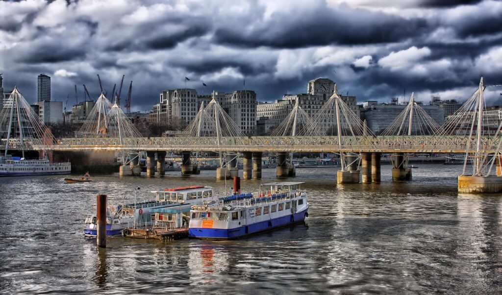 boats, river, bridge, buildings, structures, infrastructures, suspension bridge, river boats, river cruise, nature, london, england, urban, city, water, skyline, clouds, cloudy sky