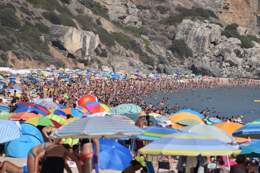 beach, people, tourists, nature, sea, umbrellas, vacation, heatwave, sun, summer, portugal, lisbon, europe