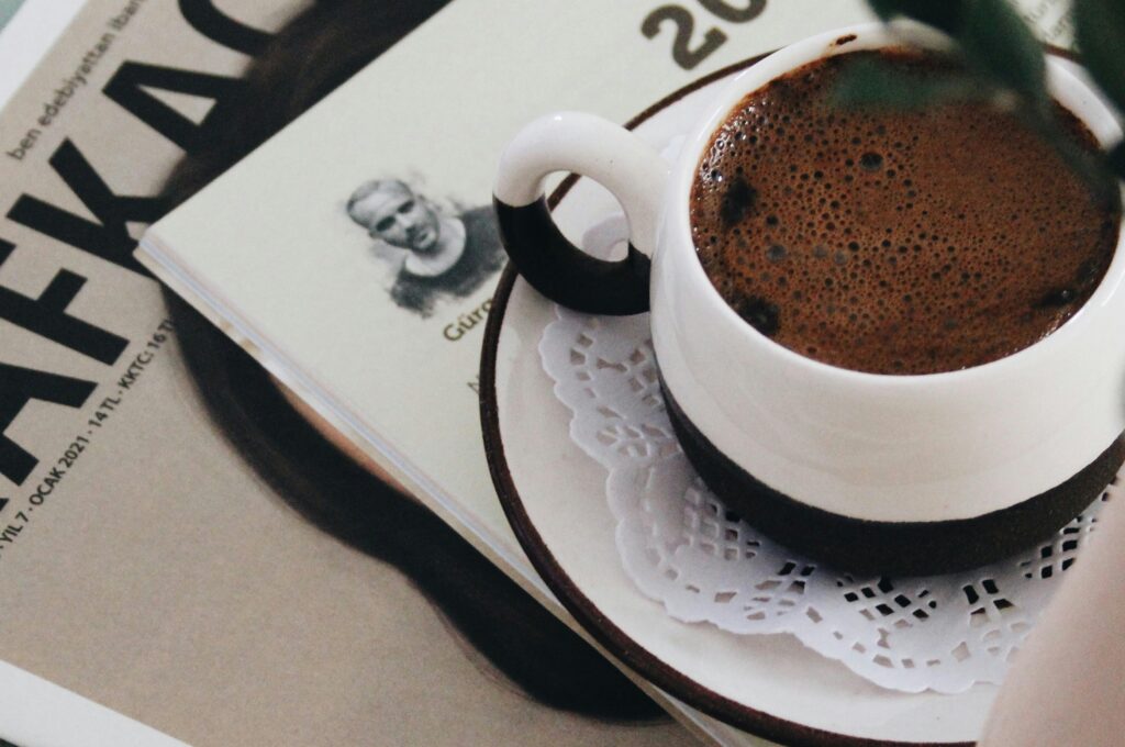 Cozy setting with a cup of coffee and Kafka book for a perfect morning read.
