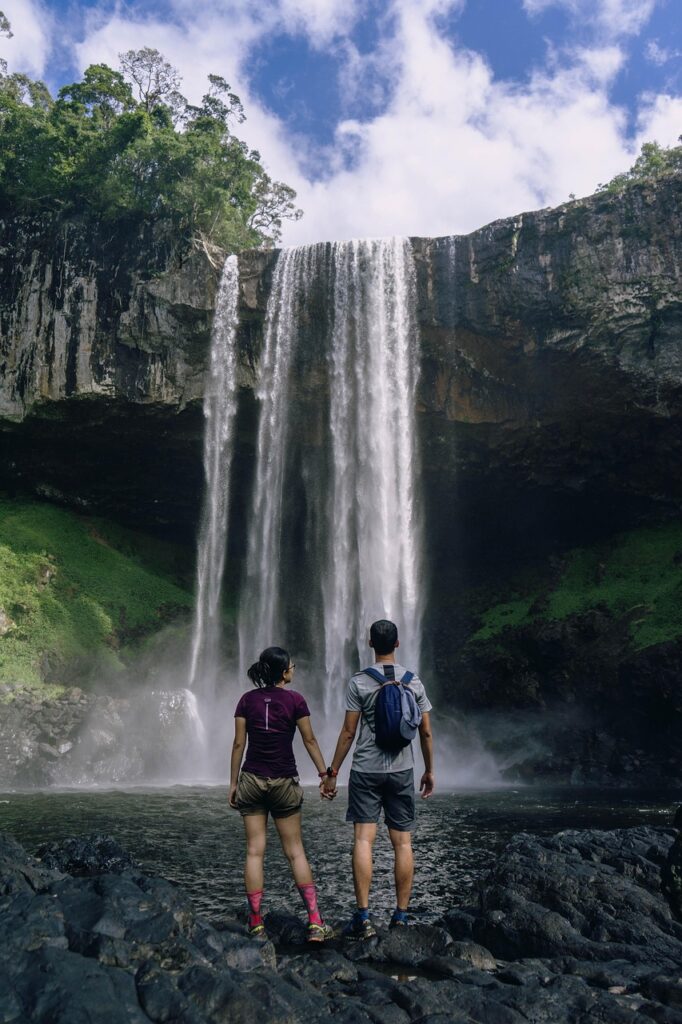 travel, phone wallpaper, wanderlust, couple, waterfalls, falls, holding hands, backpackers, backpacking, travelers, traveling, adventure, landscape, banff, trekking, trip, nature, vacation, journey, alberta, aesthetic wallpaper, iphone wallpaper