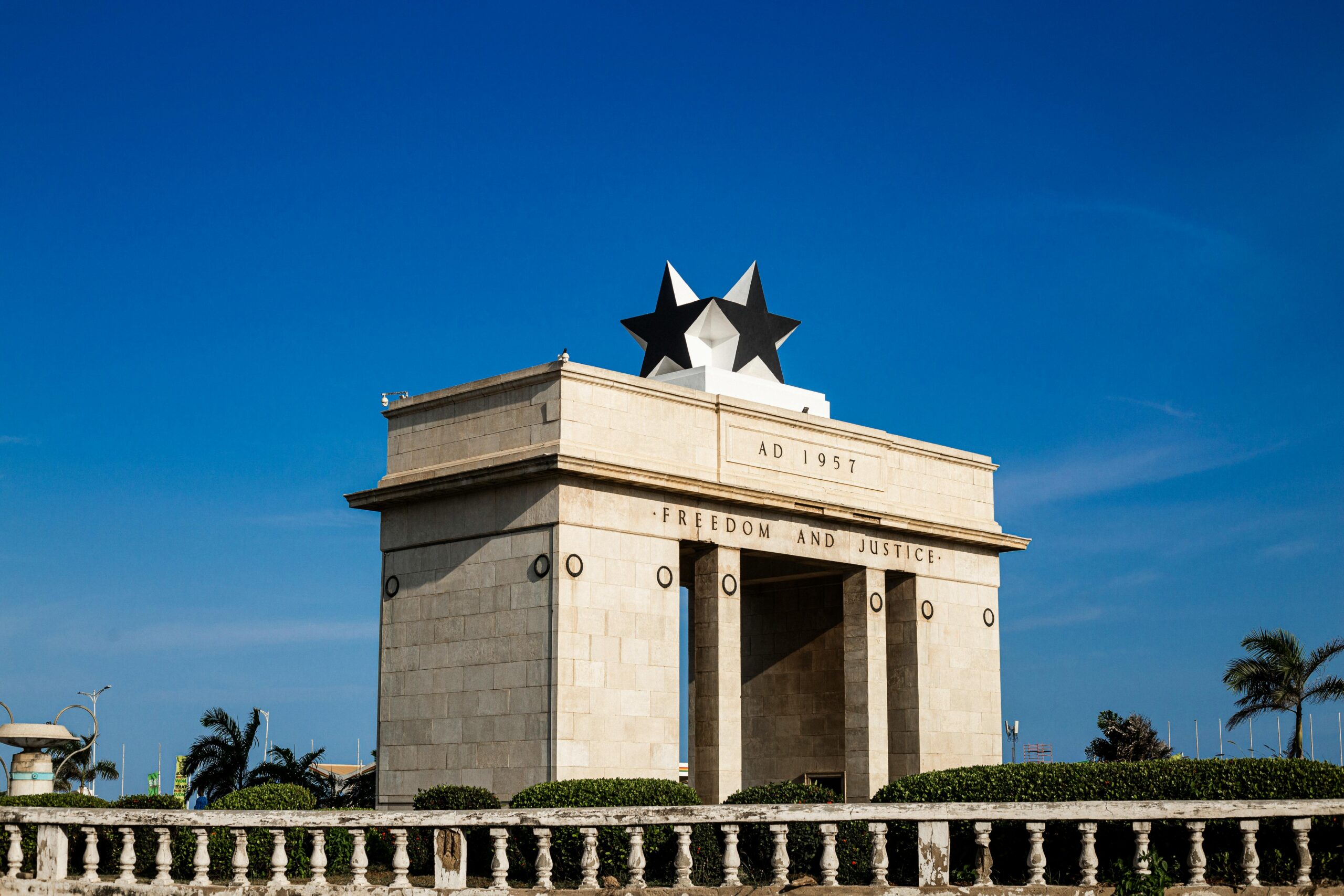 Stunning view of Independence Arch against a clear blue sky in Accra, Ghana.