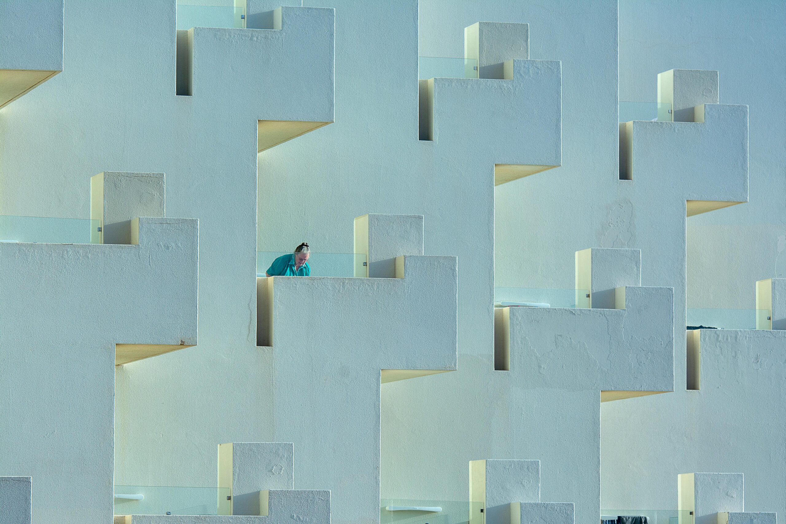 Modern architectural facade with minimalist balconies and geometric patterns in Lanzarote.