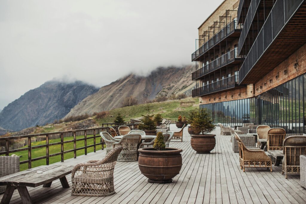 Modern hotel terrace with scenic mountain views in Mtskheta-Mtianeti, Georgia. Perfect for relaxation.
