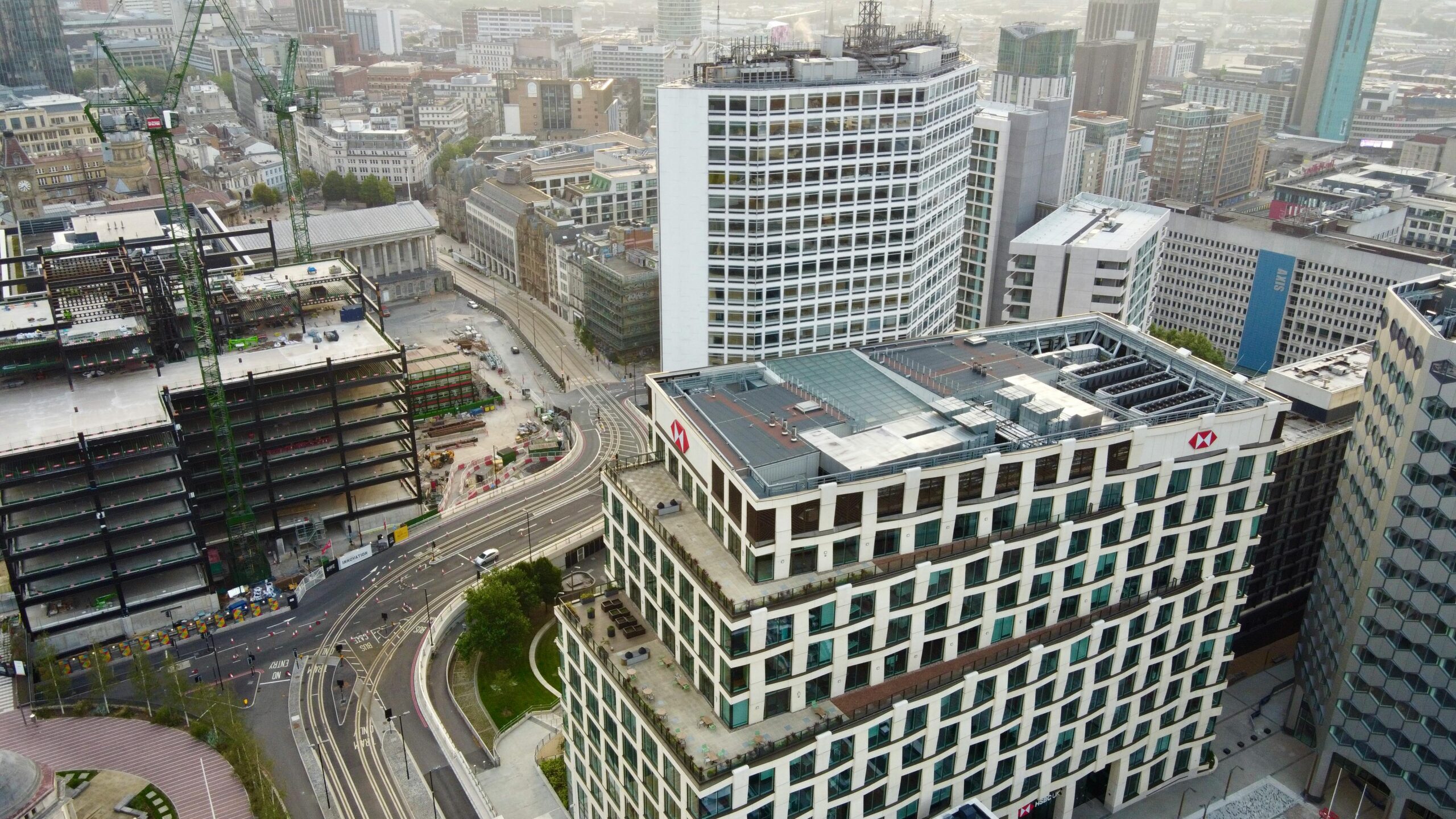Aerial view showcasing Birmingham's modern architecture and urban landscape.
