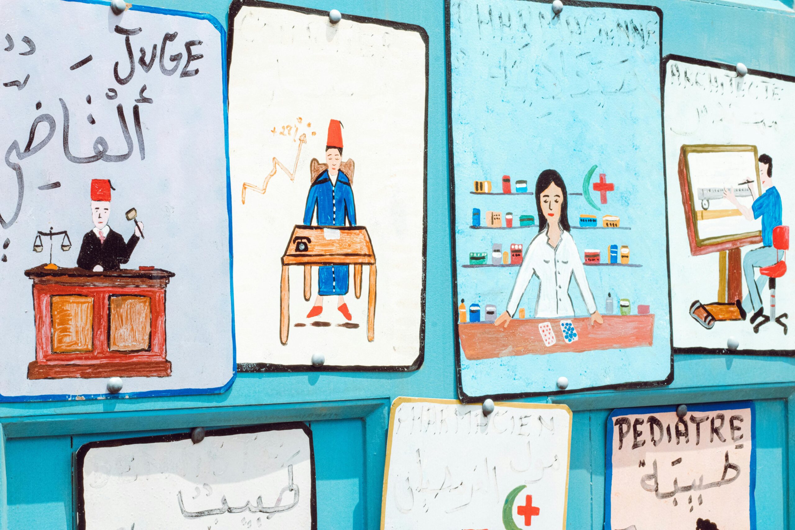 Vibrant hand-drawn illustrations depicting various professions with text in different languages.