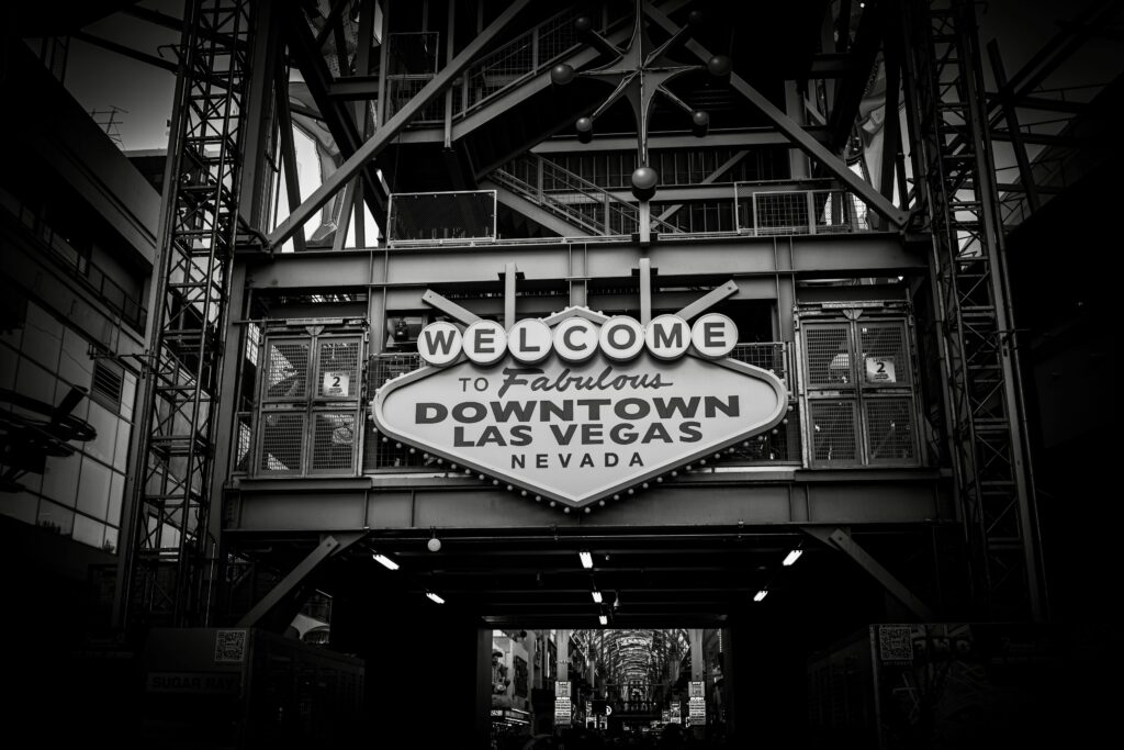 Iconic 'Welcome to Fabulous Downtown Las Vegas' sign in black and white.