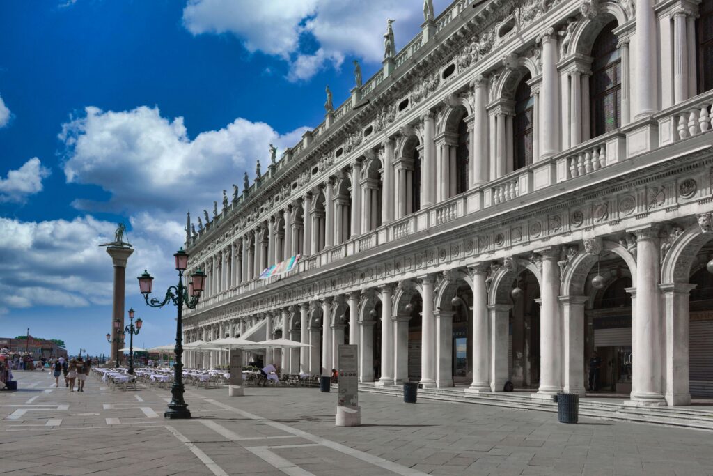 Explore the iconic architectural beauty of Venice, Italy, in this vibrant daytime shot.