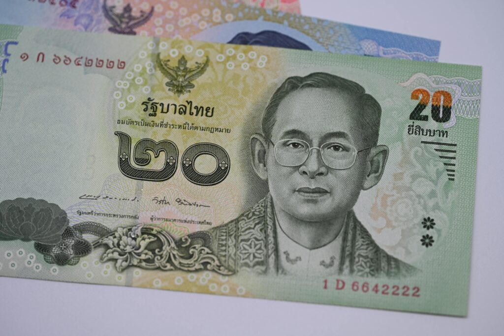 Detailed image of a 20 Thai Baht banknote highlighting traditional Thai design and currency features.