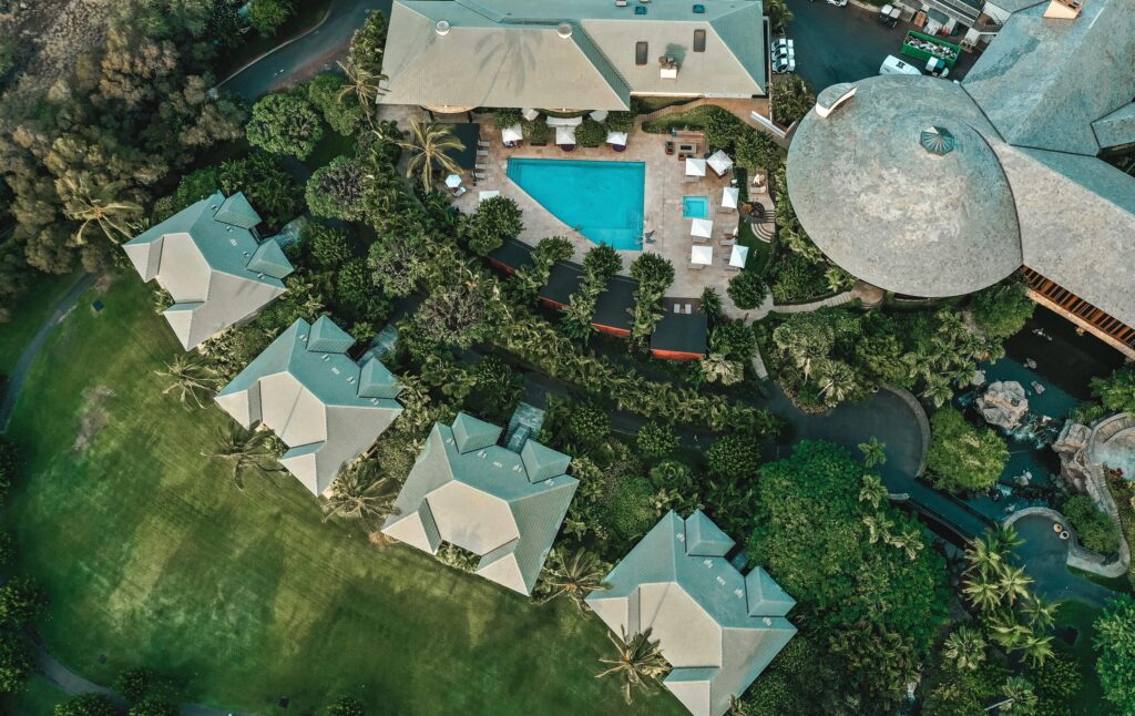 A stunning aerial shot capturing a luxurious tropical resort in Wailea-Makena, Hawaii.