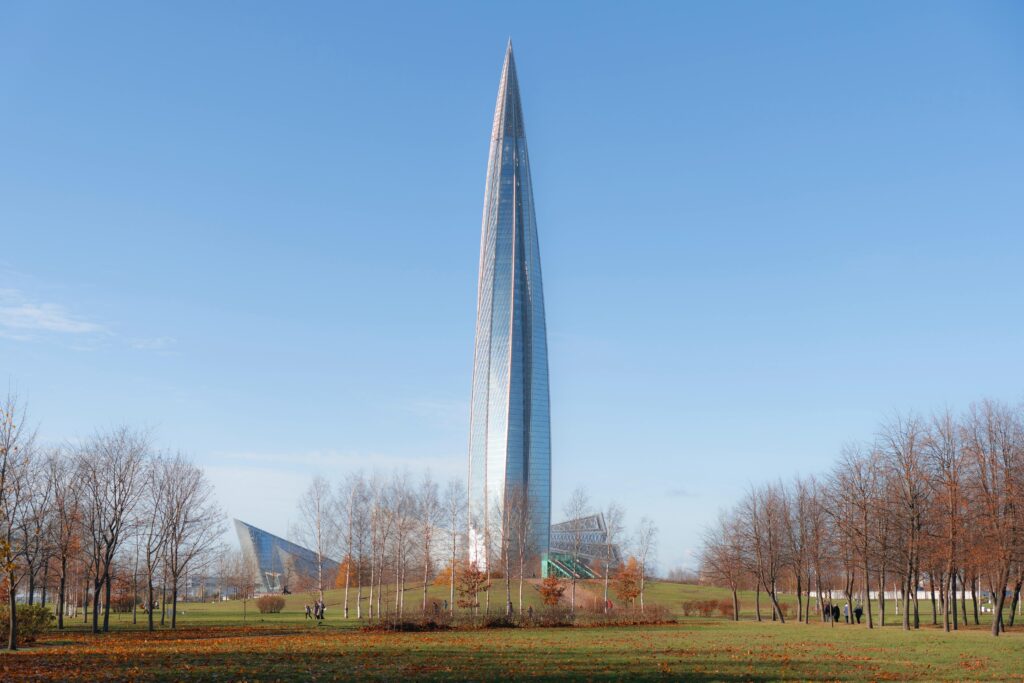 The Lakhta Center in St. Petersburg, Russia stands tall against a clear autumn sky.