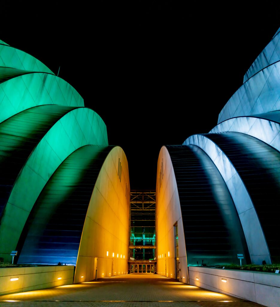Stunning nighttime view of sleek, illuminated modern architecture in Kansas City, Missouri.