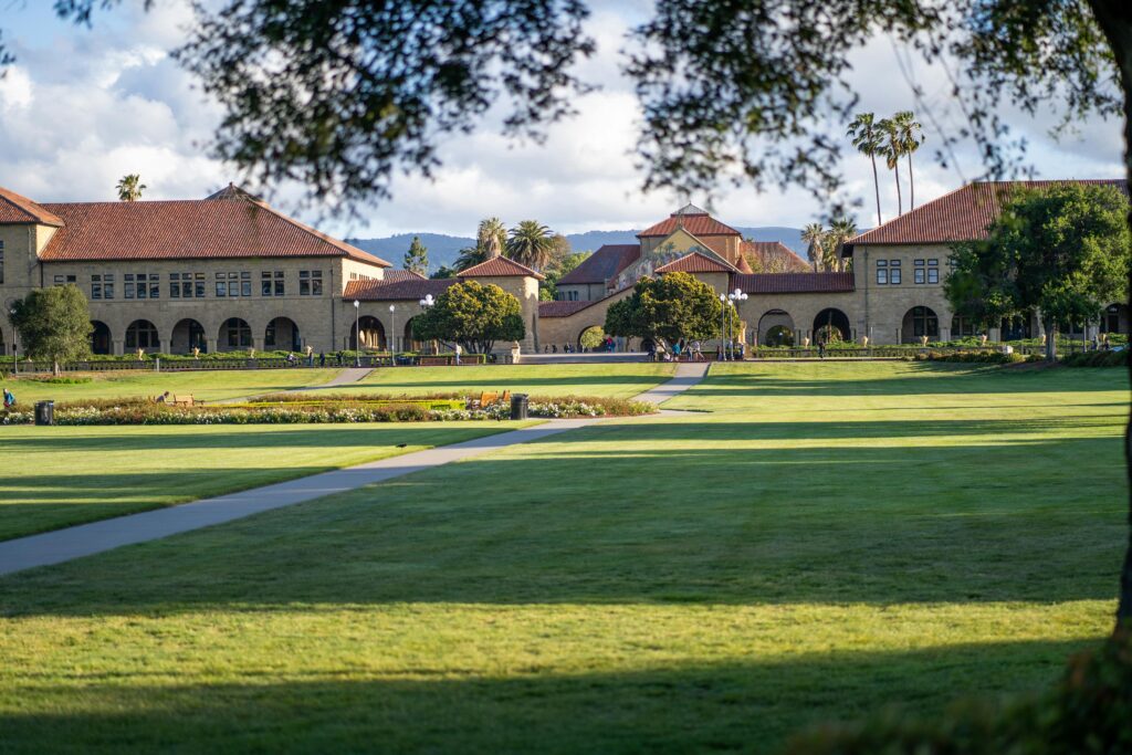 Serene view of Stanford University's iconic campus buildings and lush gardens.