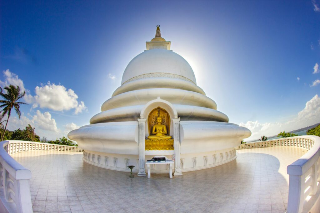 Stunning view of the Peace Pagoda at Rumassala, Unawatuna, captured during a bright day.