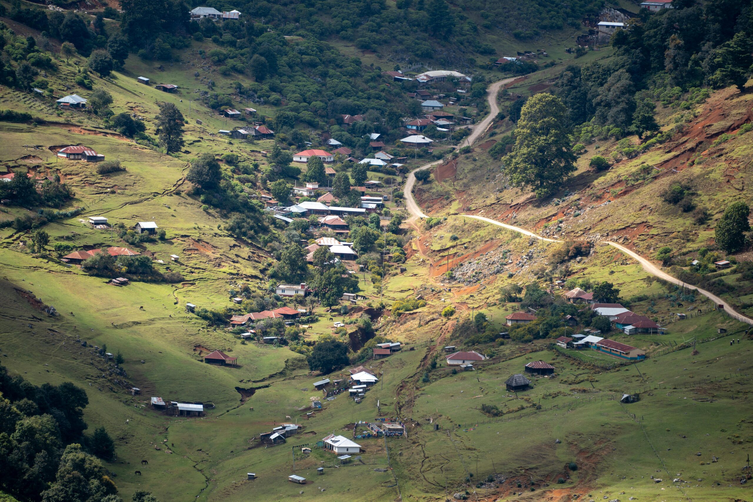 A stunning aerial view of Chiantla valley in Huehuetenango, Guatemala, showcasing rural landscapes and small communities.