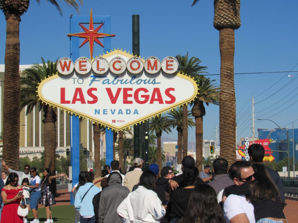 Visitors gather at the famous Welcome to Las Vegas sign, a must-see landmark in Nevada.