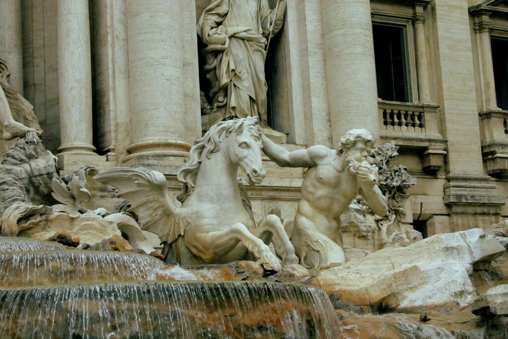 Detailed view of the Trevi Fountain sculptures, showcasing Rome's iconic artistry.