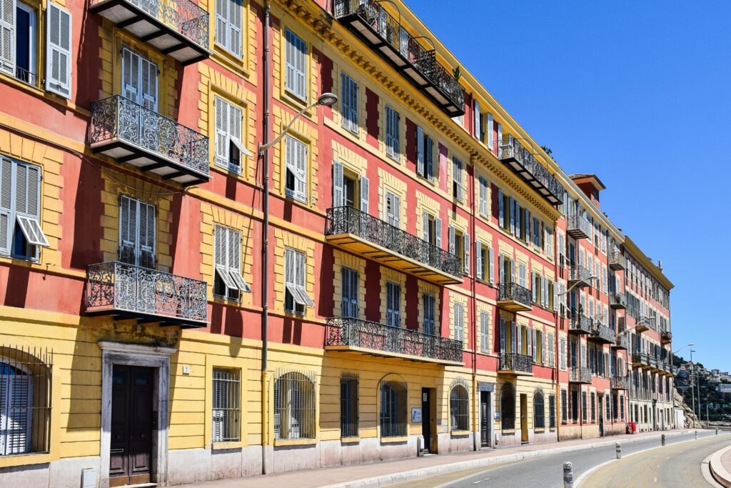 Vibrant apartment buildings showcasing French architecture in the South of France.