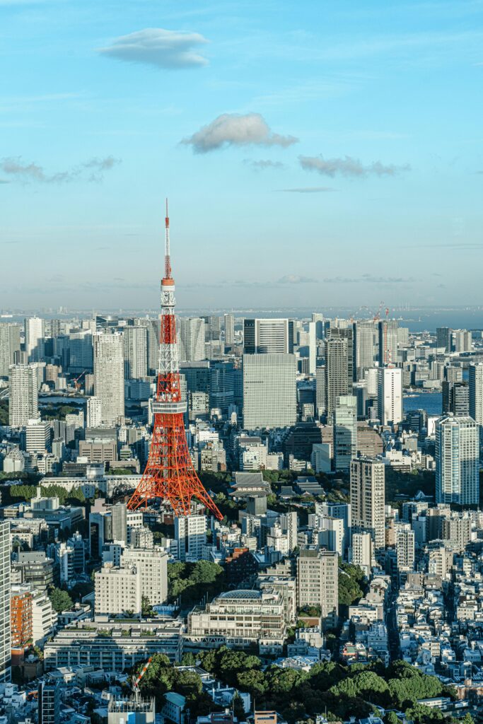 Stunning aerial view of Tokyo, showcasing the iconic Tokyo Tower amidst urban sprawl.