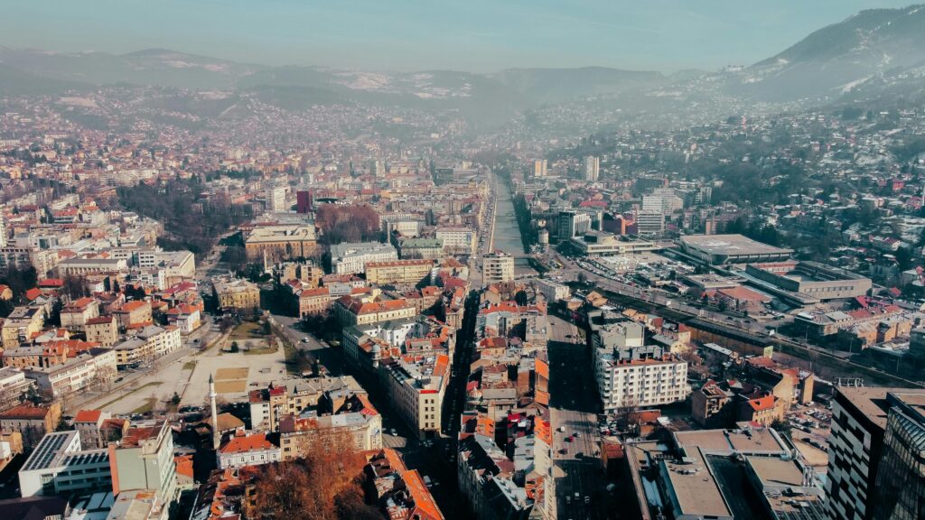 A breathtaking aerial view of Sarajevo's urban landscape during wintertime.