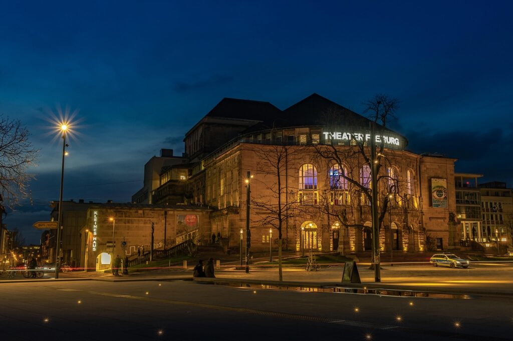 building, architecture, illuminated, city lights, stadttheater, freiburg, nature, facade, culture, historical, art, music, night, sky, night photography, night sky