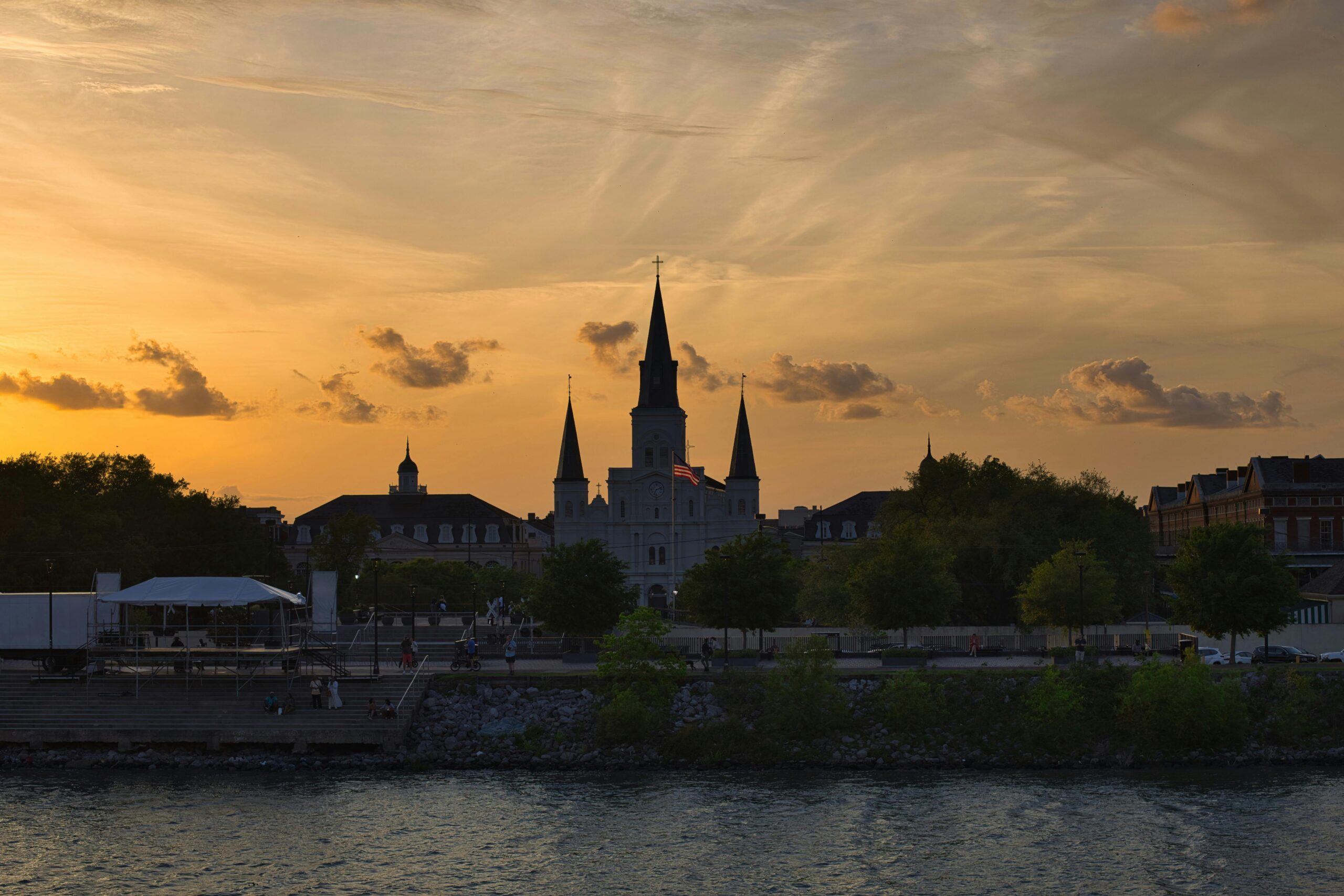 Beautiful sunset view of St. Louis Cathedral and Jackson Square in New Orleans, Louisiana.