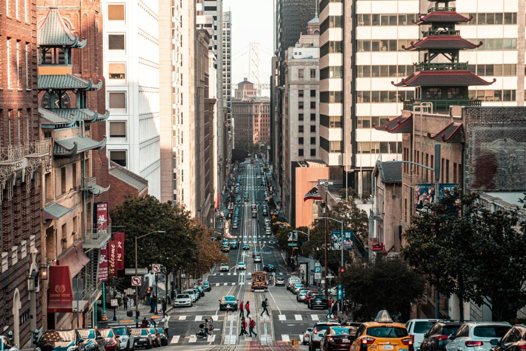 Vibrant city life on a busy San Francisco street with iconic architecture.