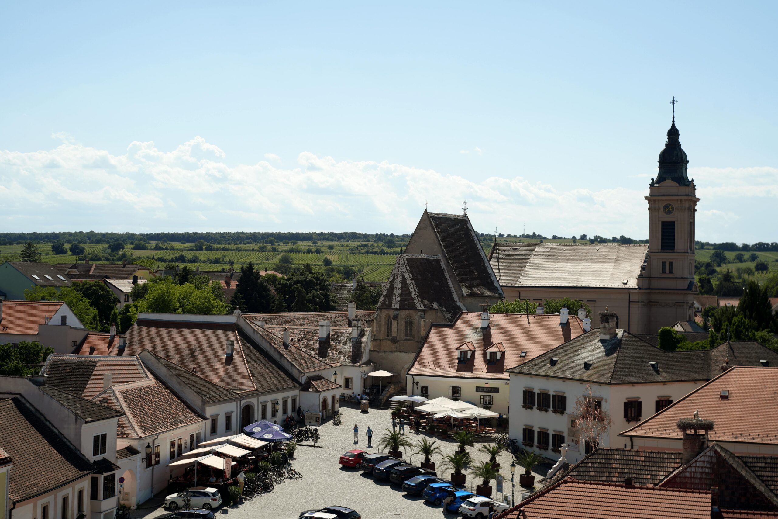 Aerial view of a charming village in Burgenland, Austria, showcasing architecture and countryside beauty.