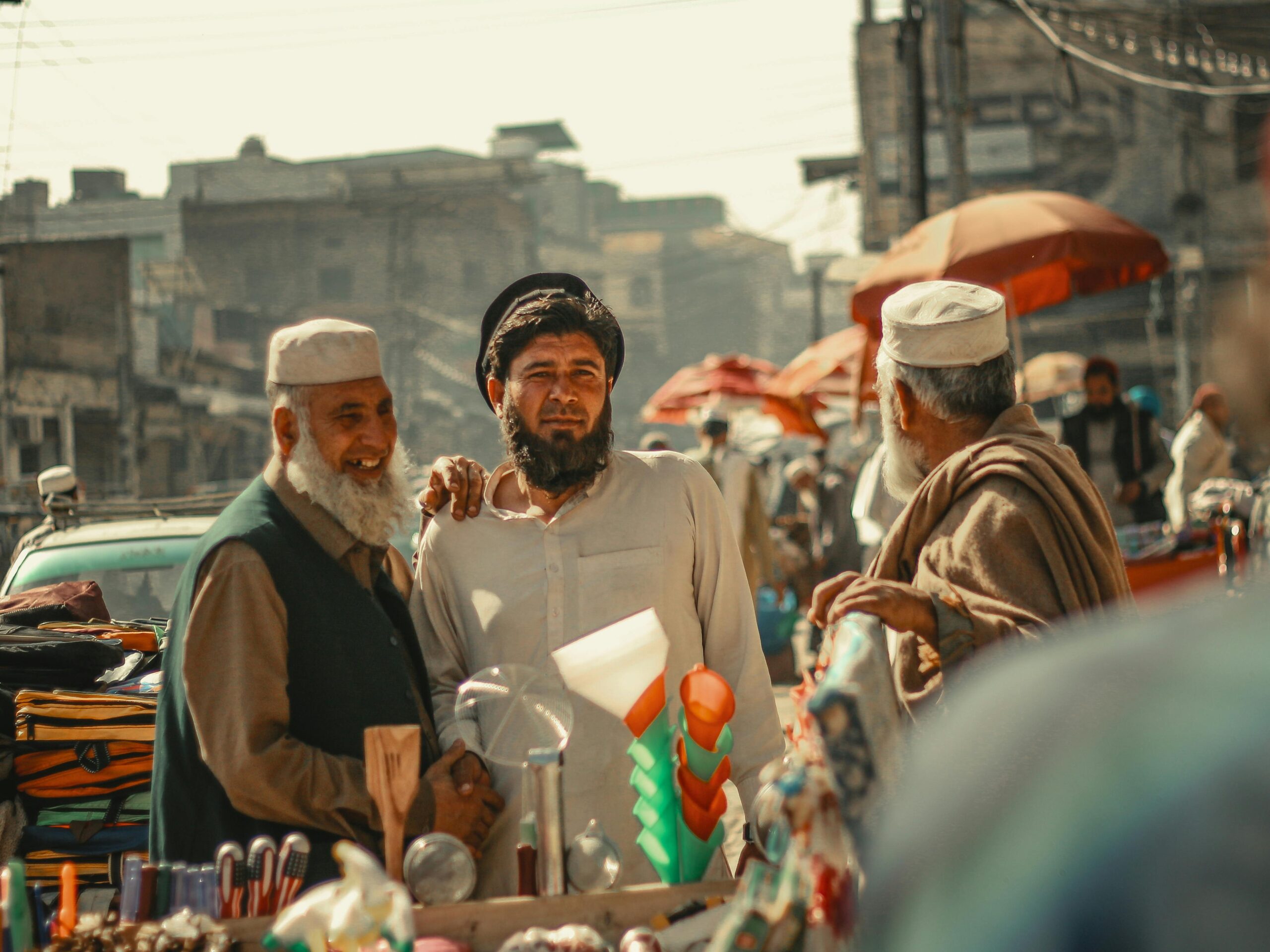 A bustling street market in Peshawar, Pakistan, showing local culture and daily life.