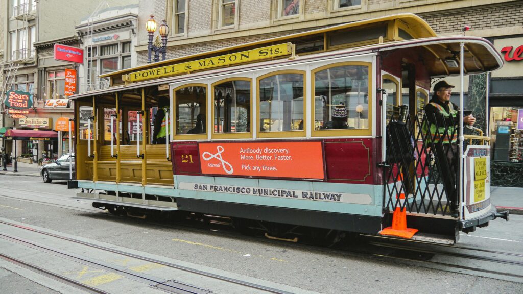 San Francisco cable car on Powell Street, showcasing classic urban transit charm.